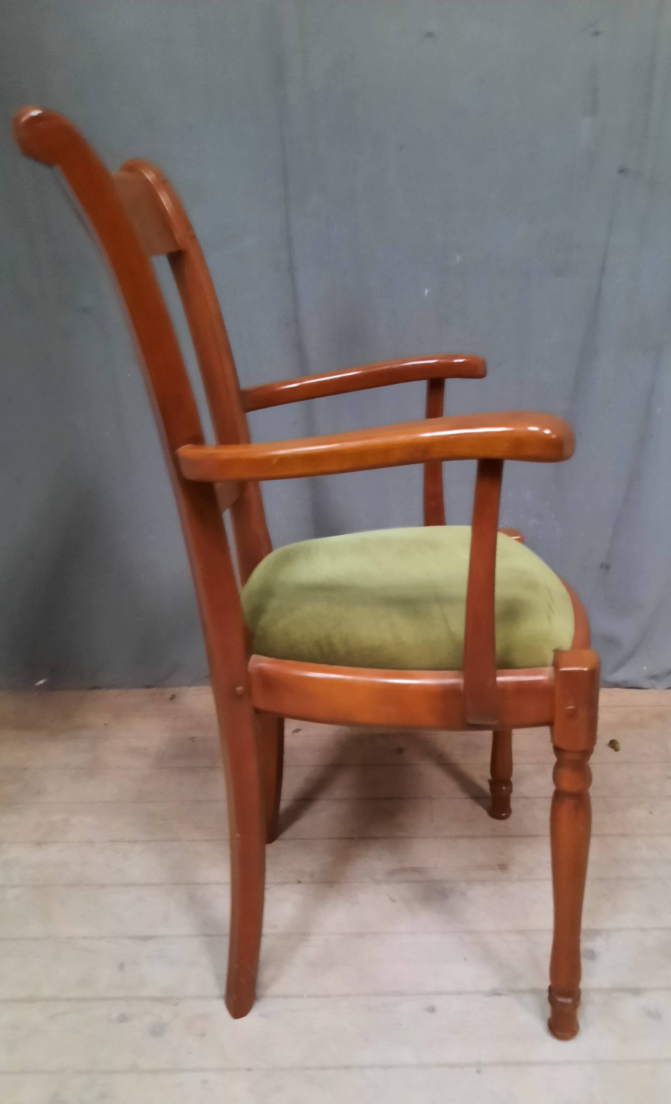 Modern armchair in varnished wood