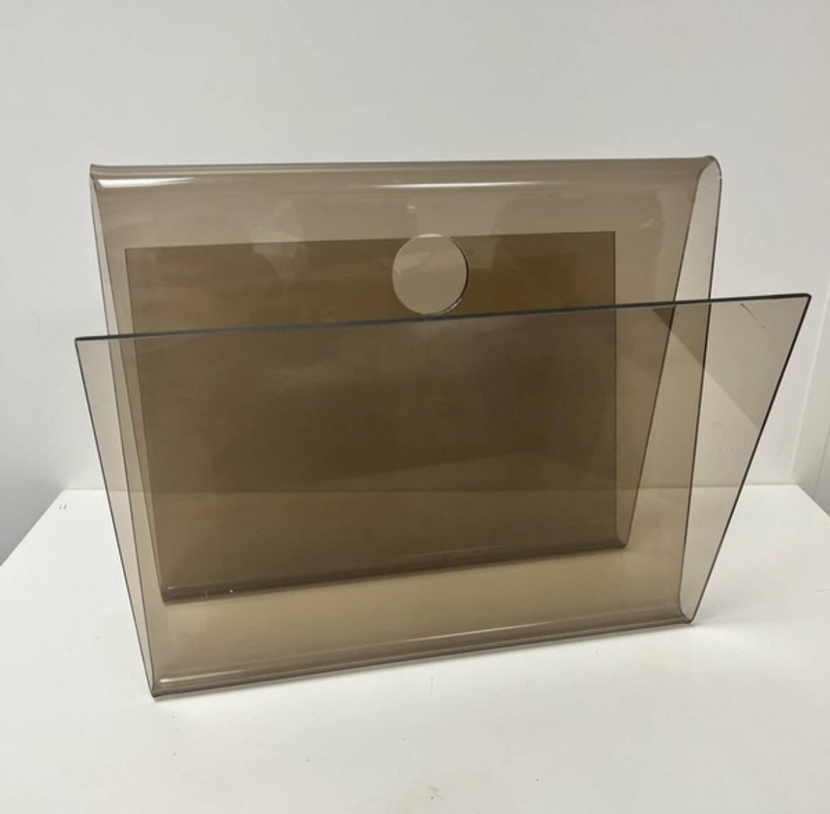 Smoked plexiglass magazine rack in the style of Michel Dumas, France, 1970s.