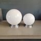 Pair of ceiling lights or wall lights with white glass globes.