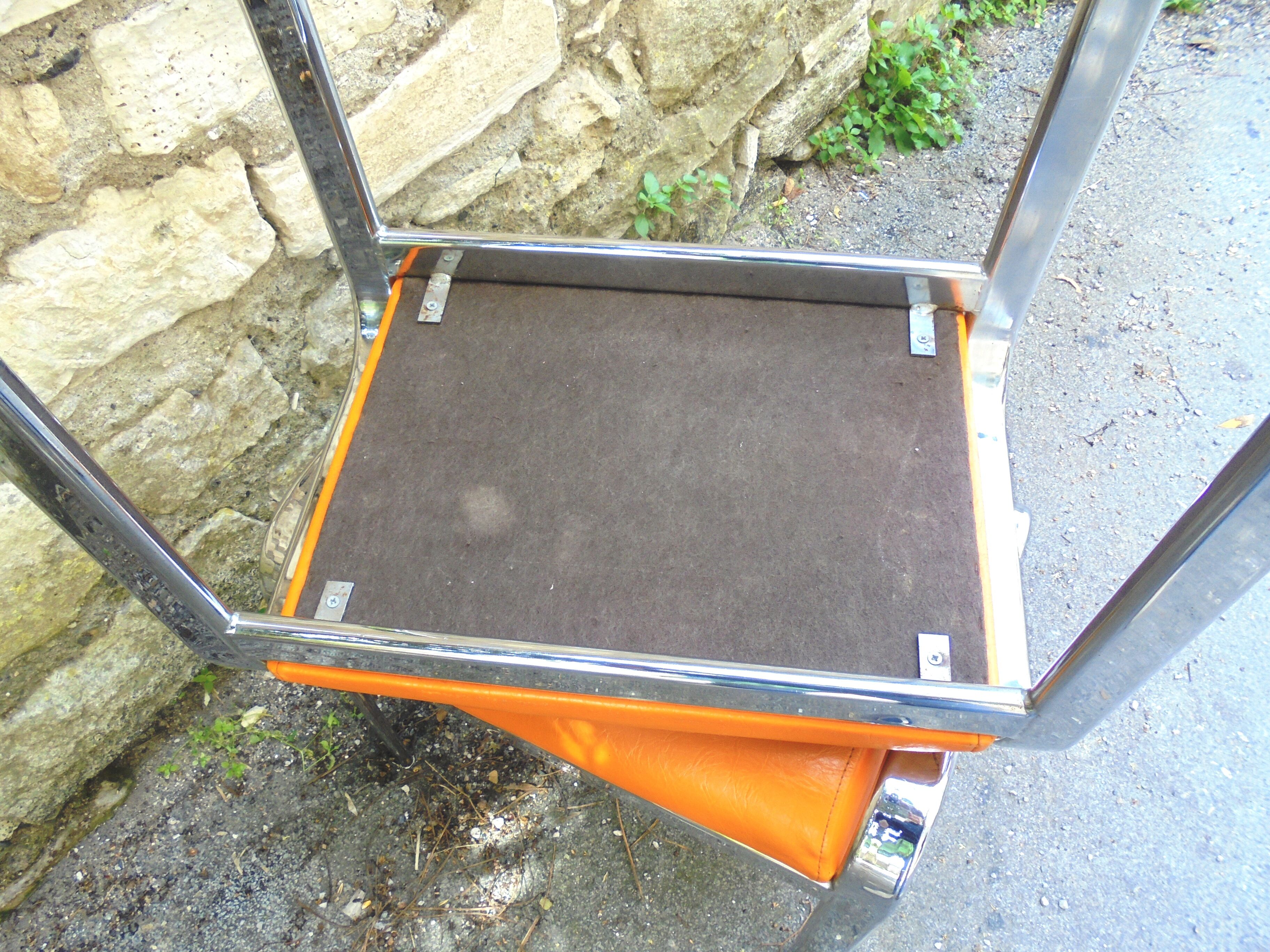 Pair of chrome and faux orange vintage stools "70"