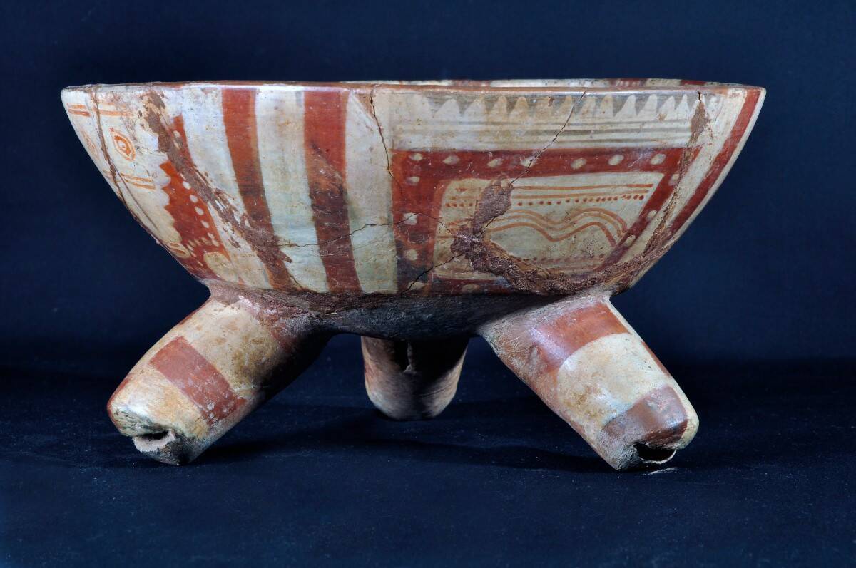 Polychrome ceramic tripod cup from the Mesoamerican tradition