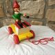 Old toy to pull Pinocchio and his xylophone