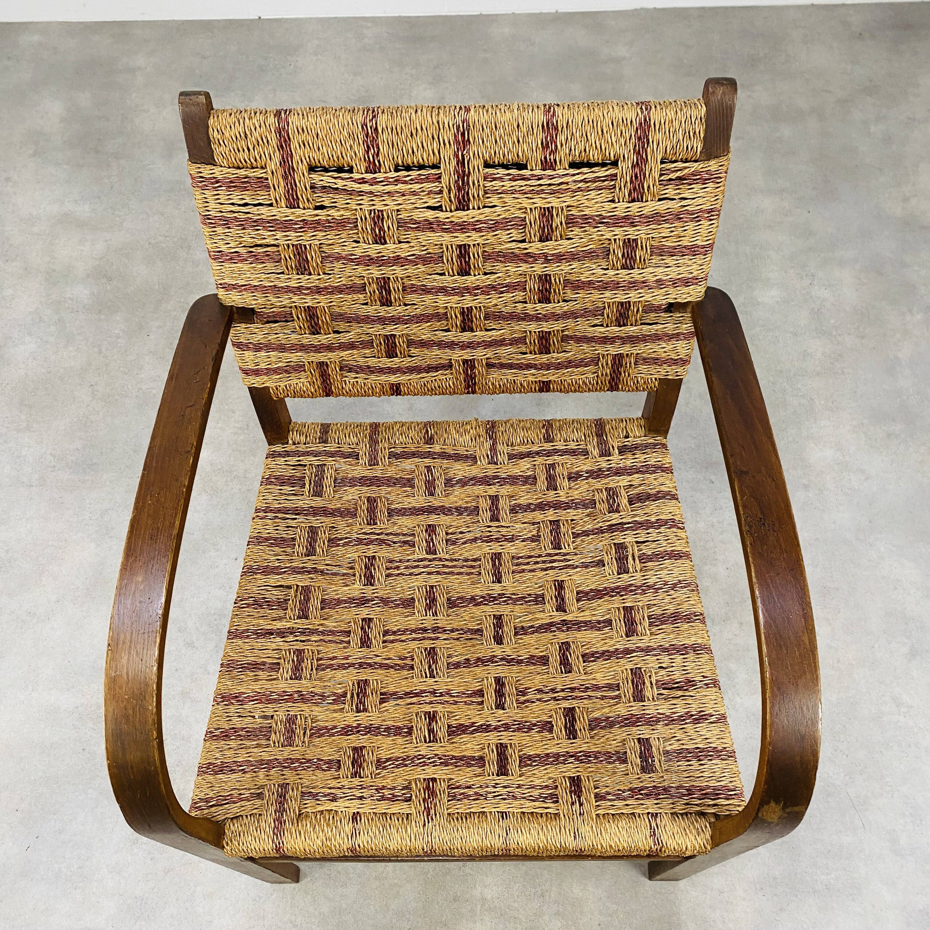 Scandinavian armchair in wood and vintage straw rope