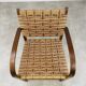 Scandinavian armchair in wood and vintage straw rope