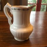 Old milk jug limoge