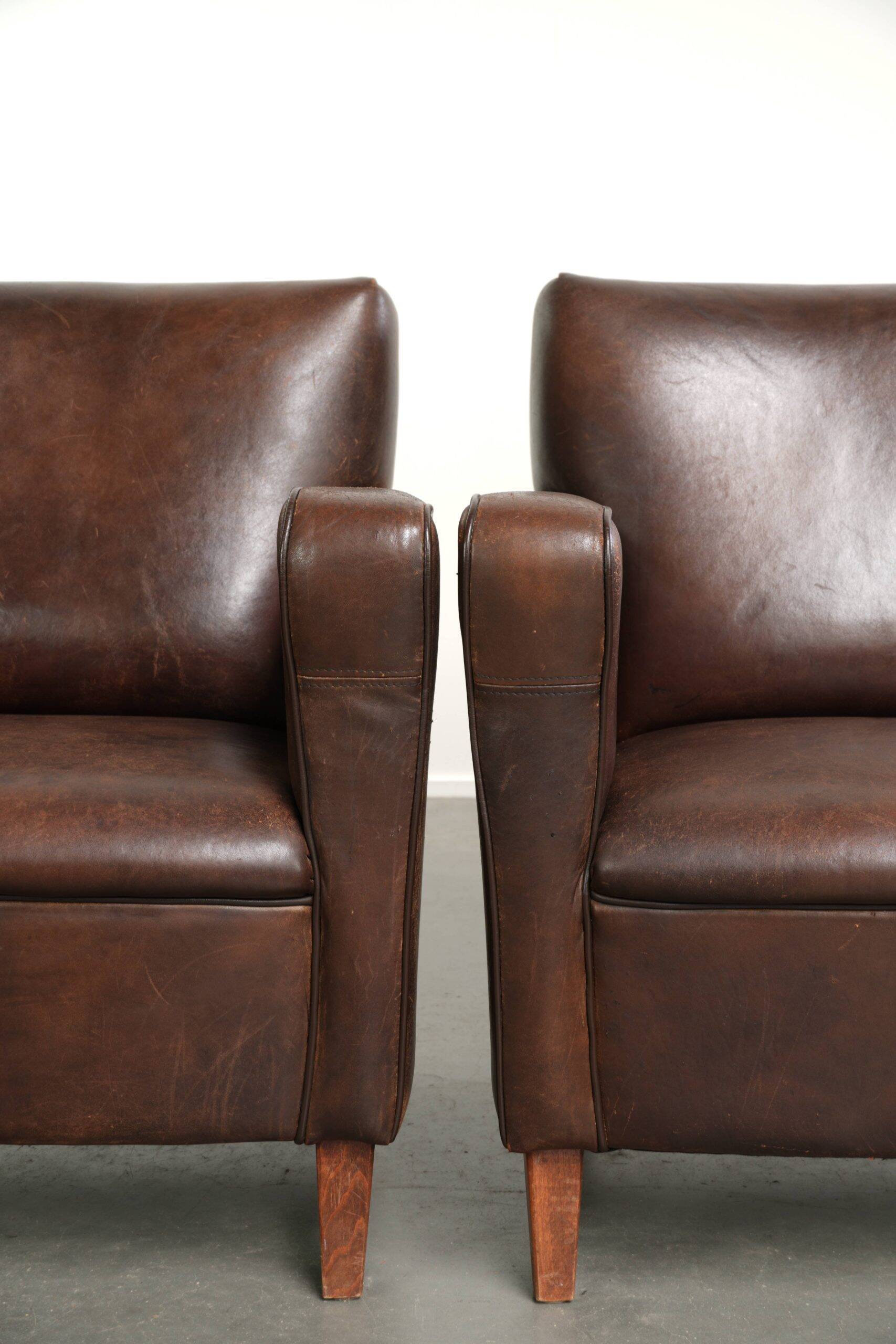 Sturdy set of vintage sheepskin armchairs with a nice English design