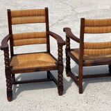 Pair of stained oak and straw armchairs, French work, 1950