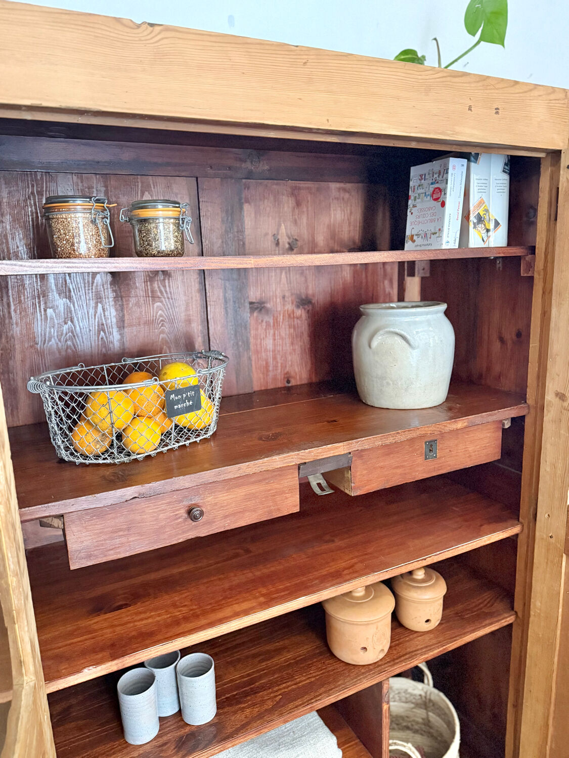 Glass-fronted cabinet in solid wood
