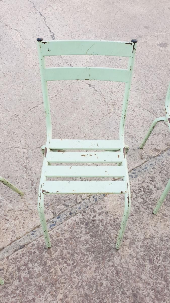 Four vintage metal chairs