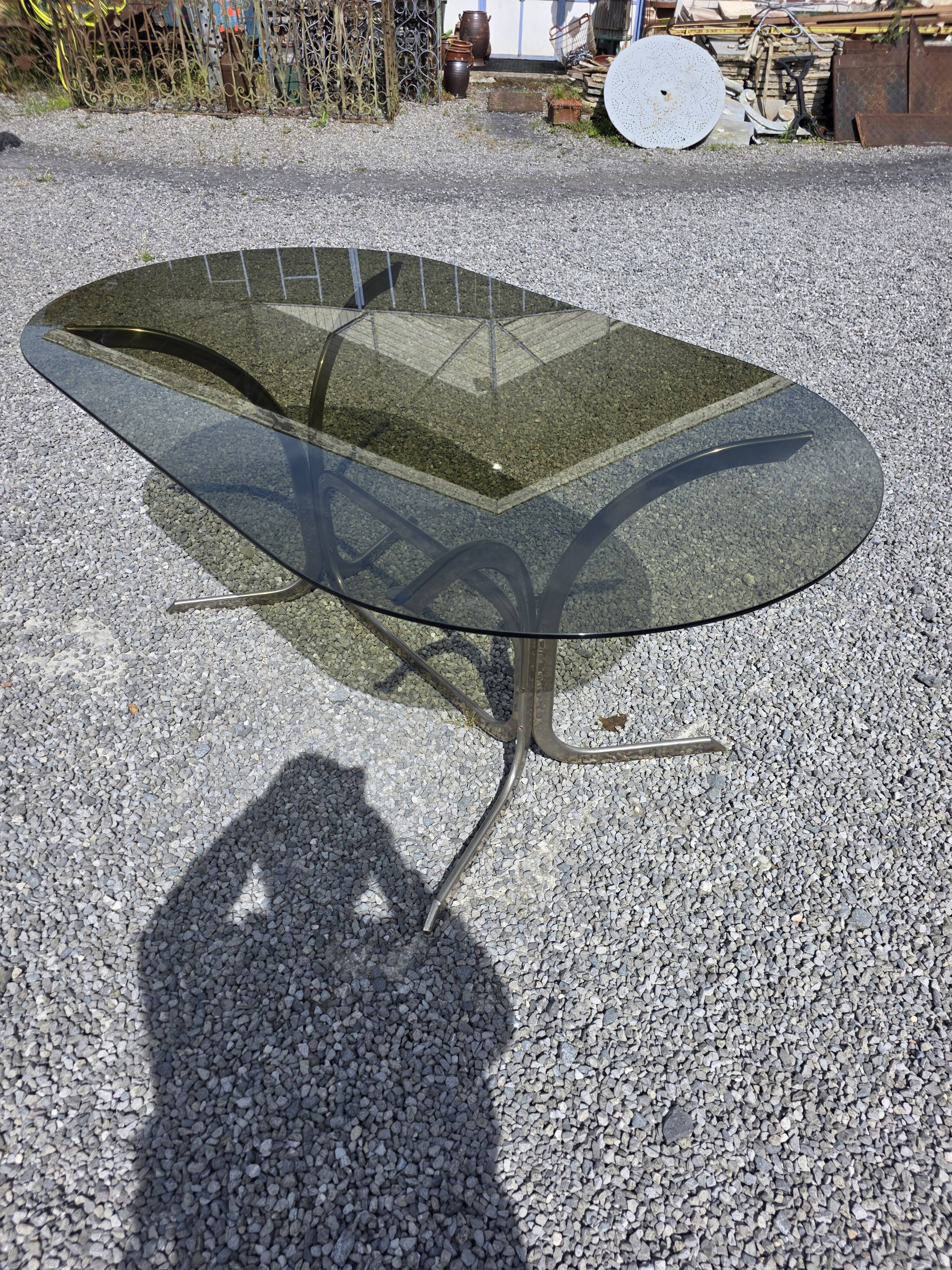 Silver metal table with smoked glass top from the 1970s.