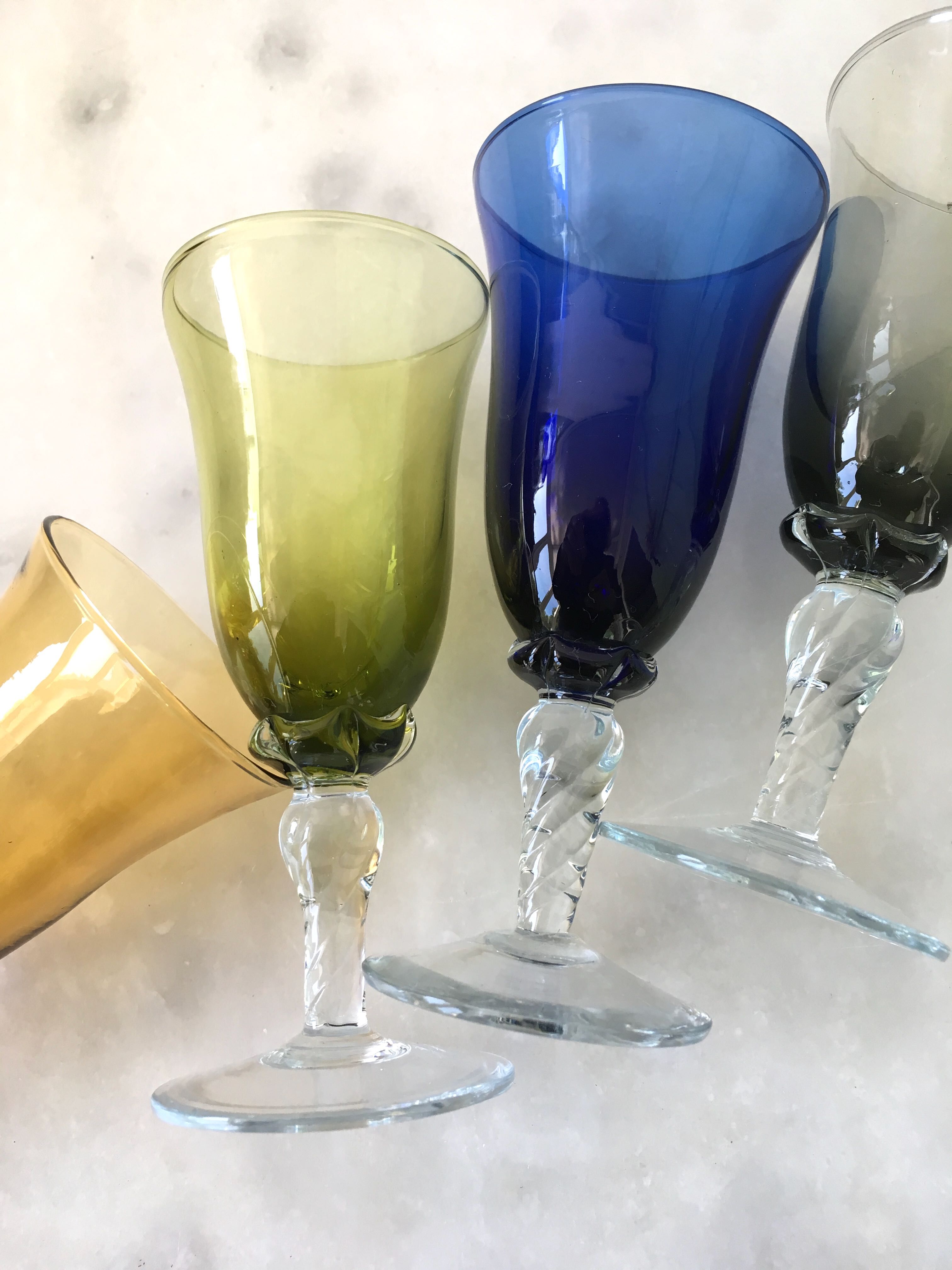 Set of four colored blown glasses