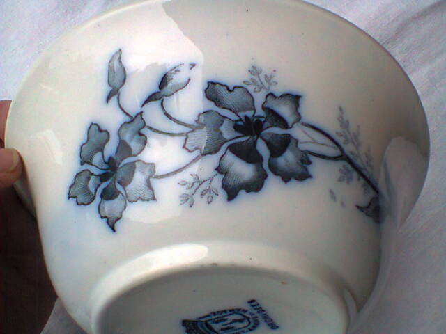 Ramekin in earthenware with decoration of flowers, butterflies and birds