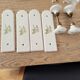 Set of 2 Porcelain door handles and cleanliness plates