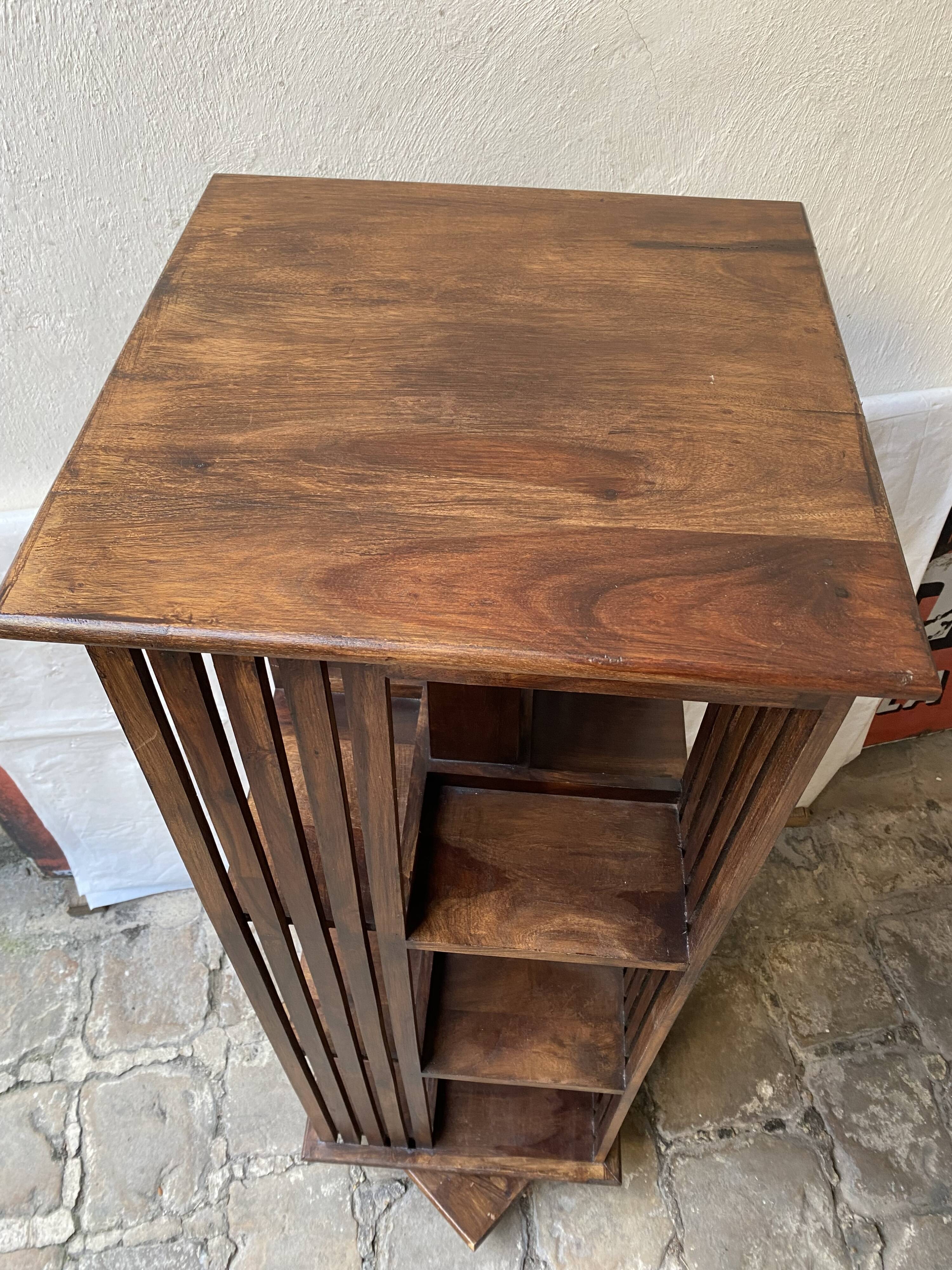 Pivoting column library in mahogany, 20th century.