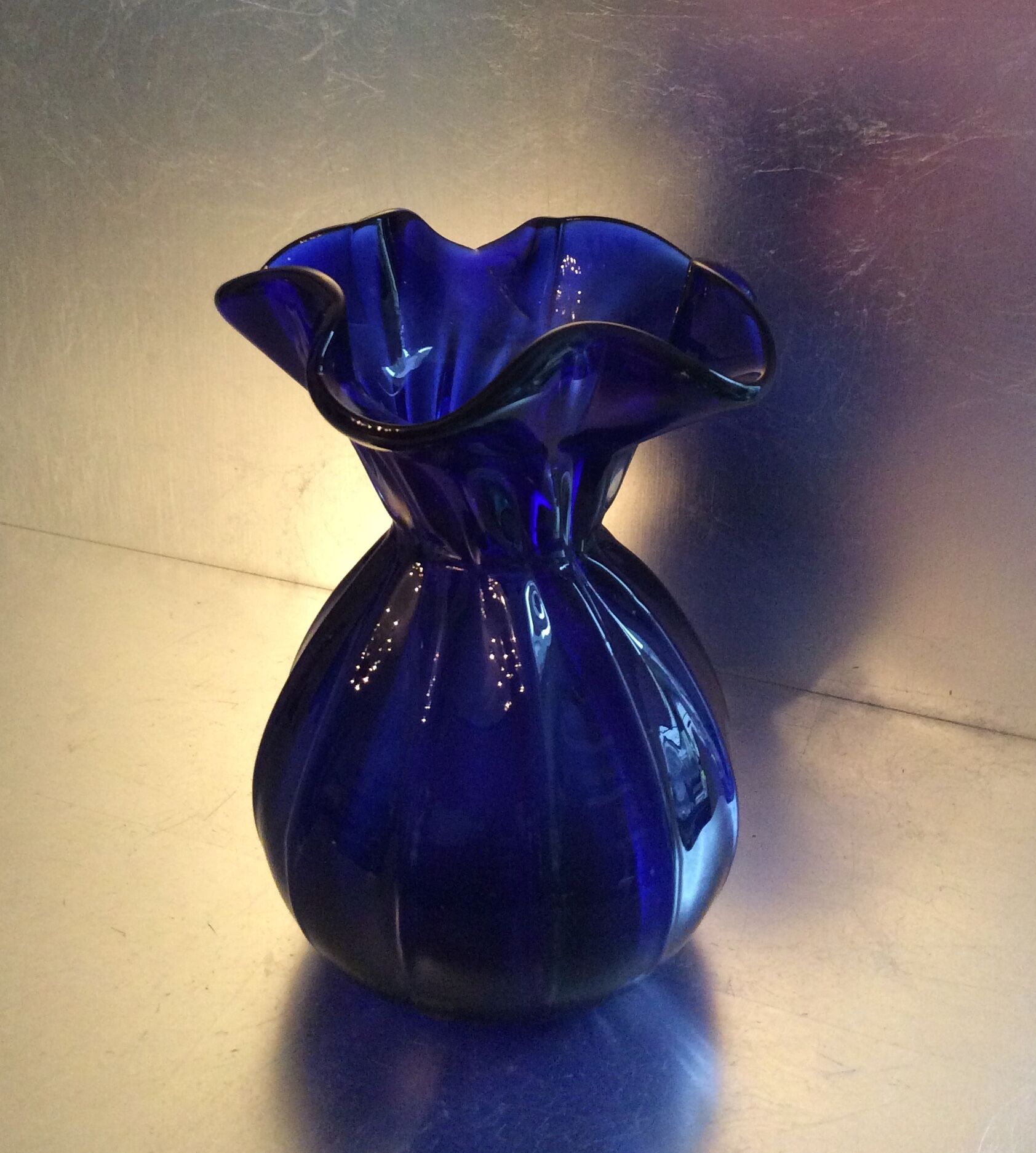 Vintage vase in blue glass paste