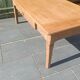 Solid wood coffee table with drawer and original key.