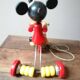 Old Mickey Mouse toy on his wooden tricycle