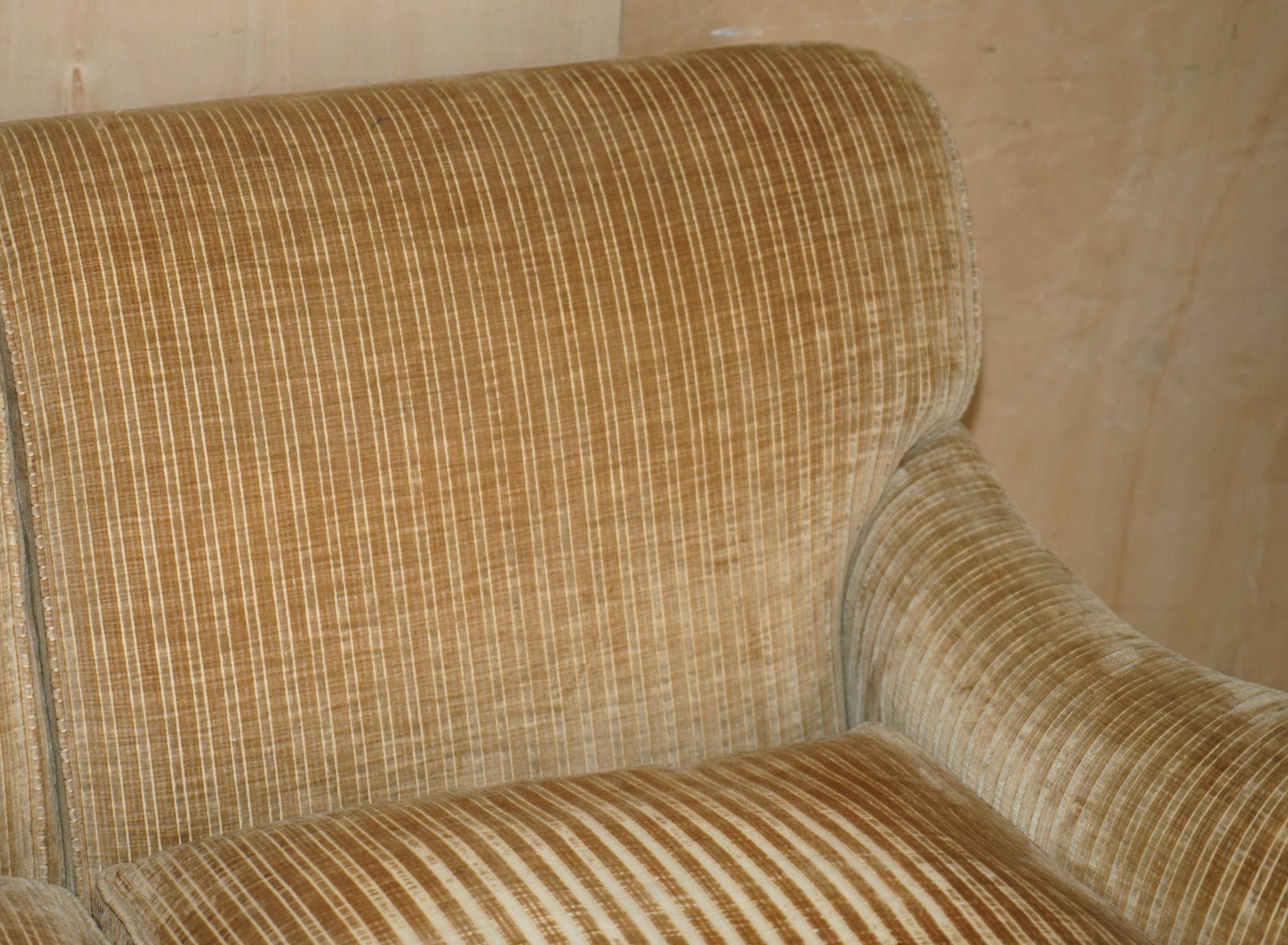 Howard & Sons / Chairs Ltd two-seater canapé with feather-filled cushions.
