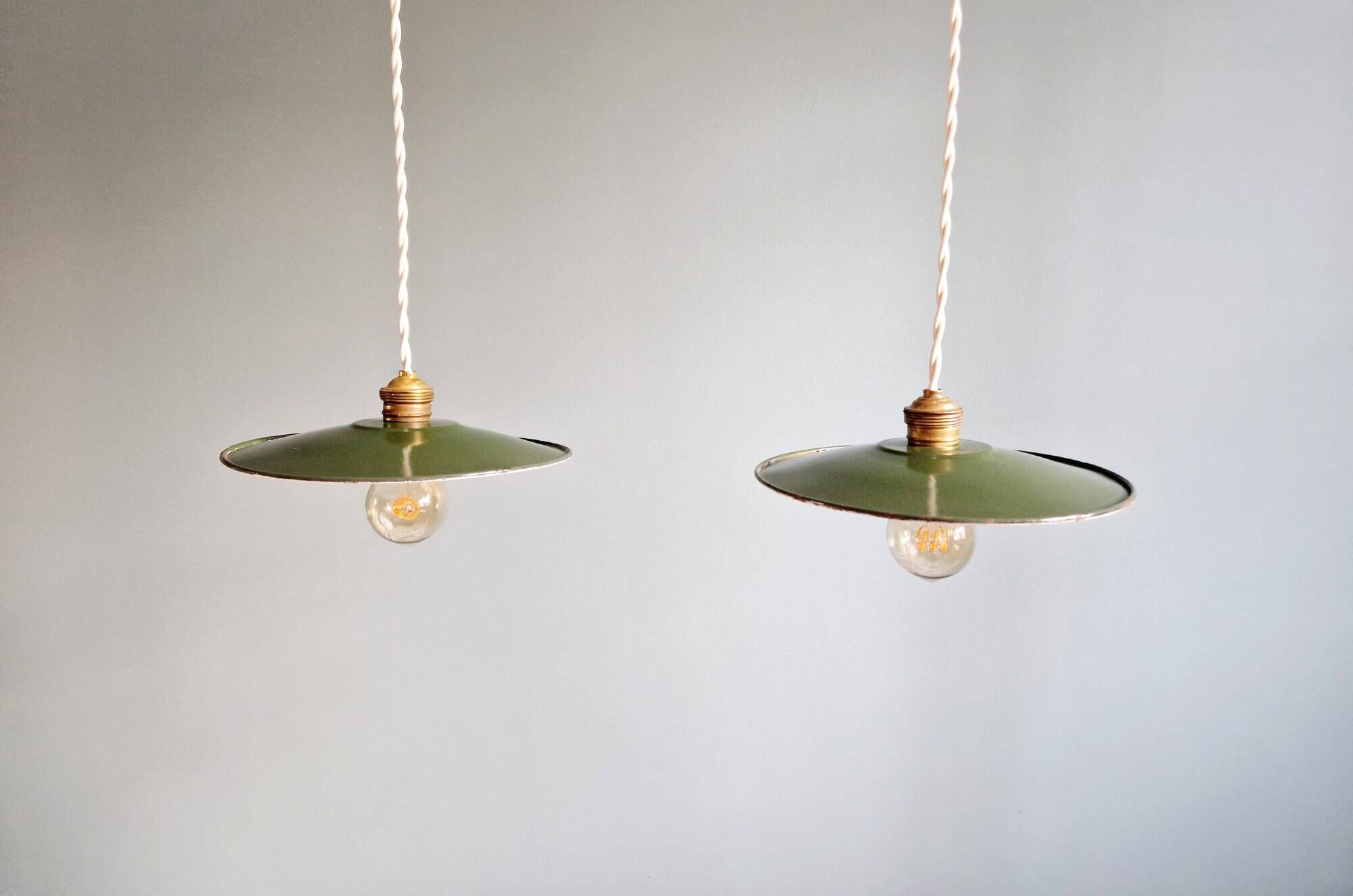 Pair of industrial pendant lights in green enamelled sheet metal