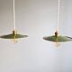 Pair of industrial pendant lights in green enamelled sheet metal