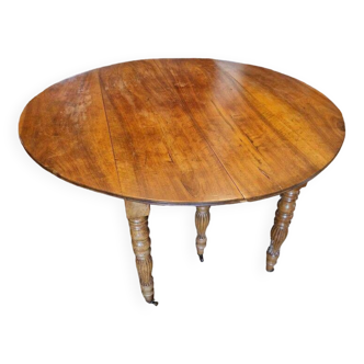 Round table with 6 legs and movable leaves