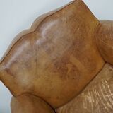 Pair of French club chairs with moustache back in cognac leather, 1940s