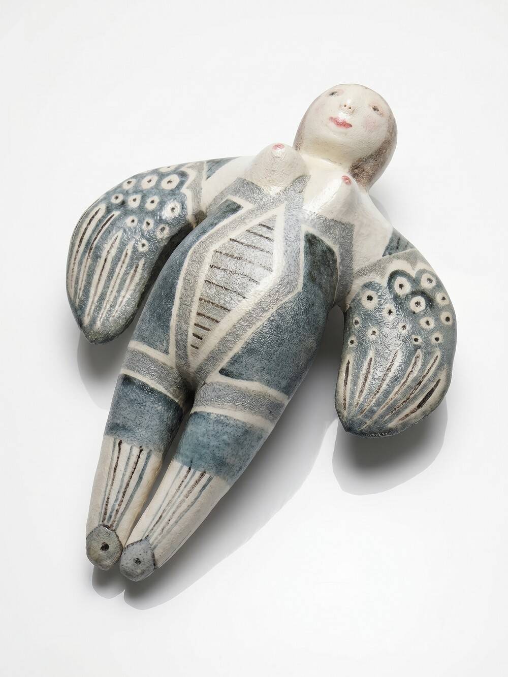 Vintage stylised mermaid ceramic wall sculpture from an art studio.