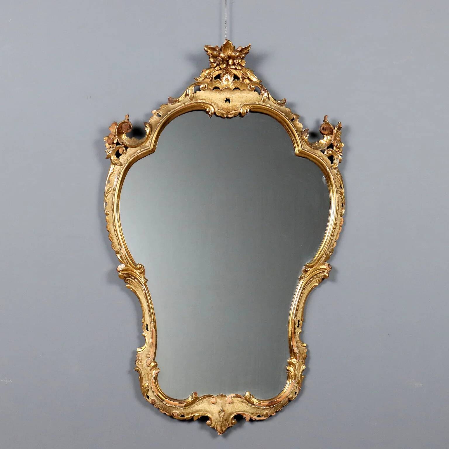 Antique baroque-style mirror in carved wood, Italy, 19th century.