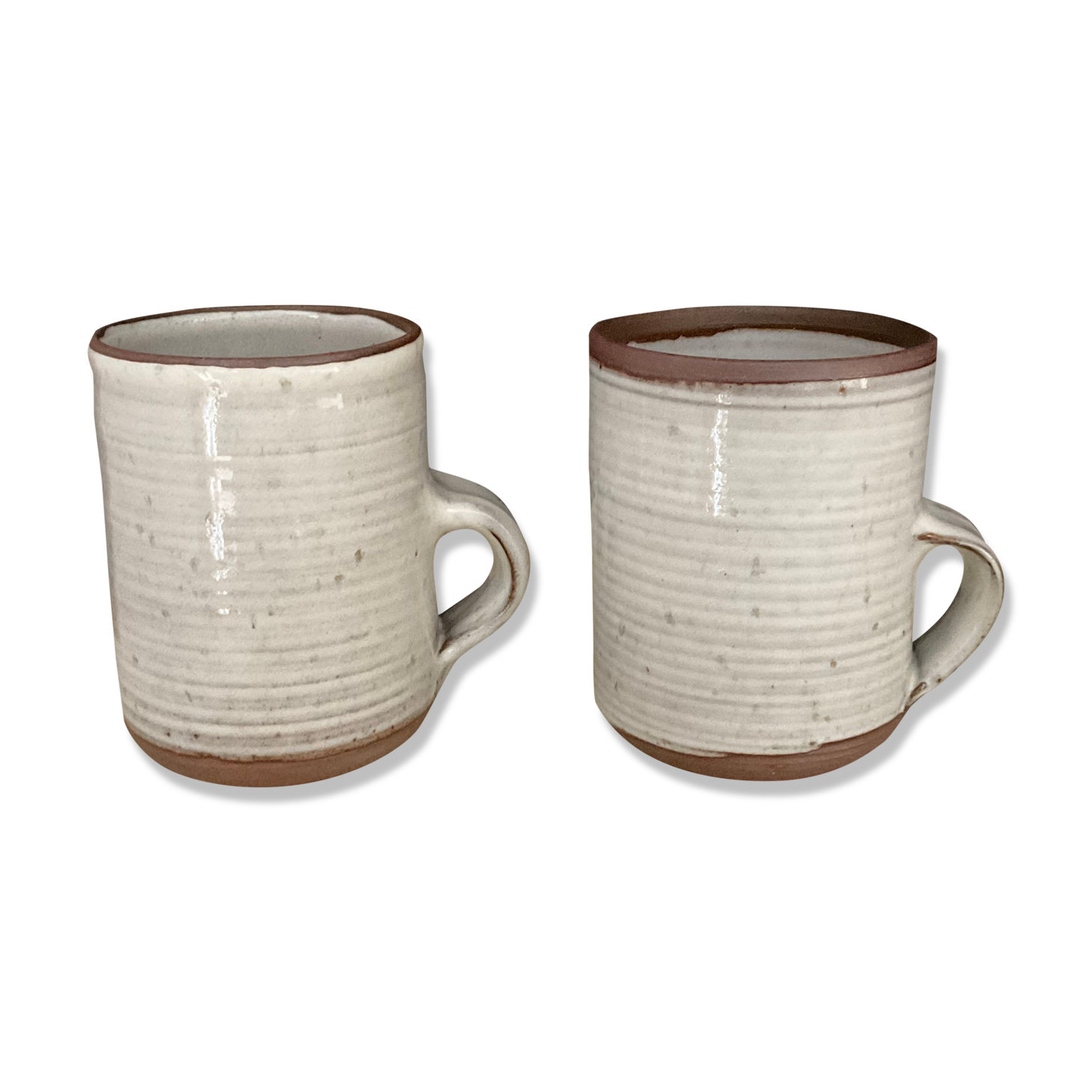 2 Mugs in Sandstone.Roger Jacques St Amand .vintage