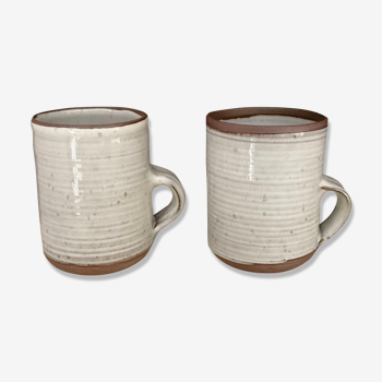 2 Mugs in Sandstone.Roger Jacques St Amand .vintage