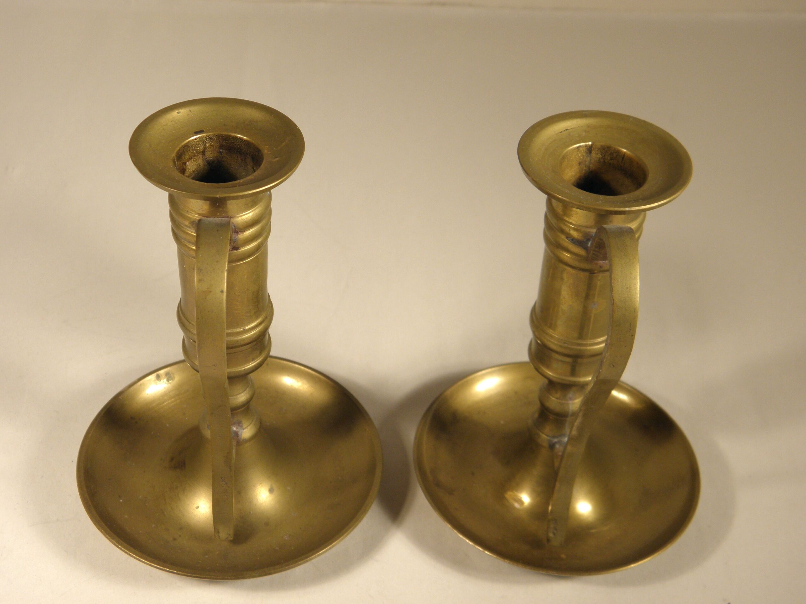 Pair of brass candle holders