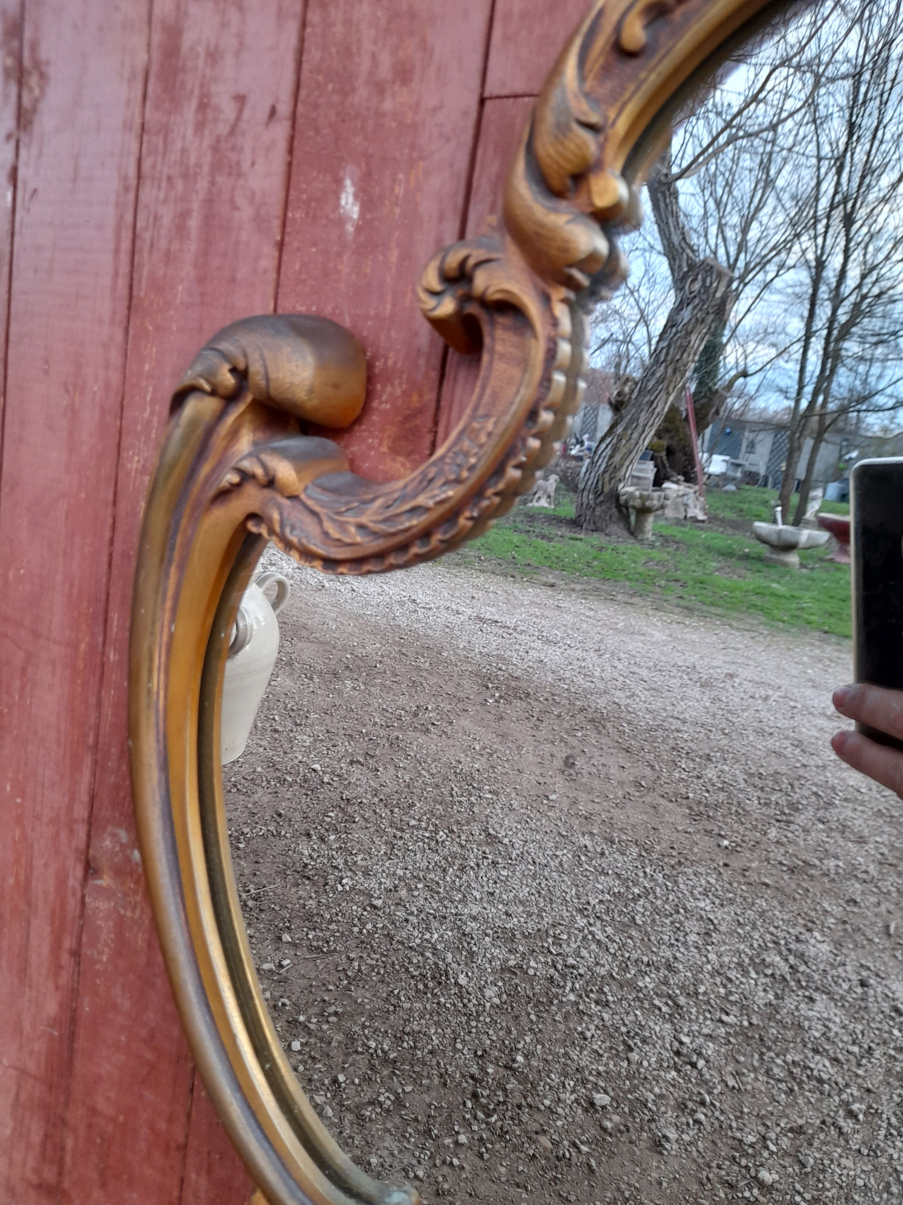 Louis XV style rock mirror in bronze  69x70cm