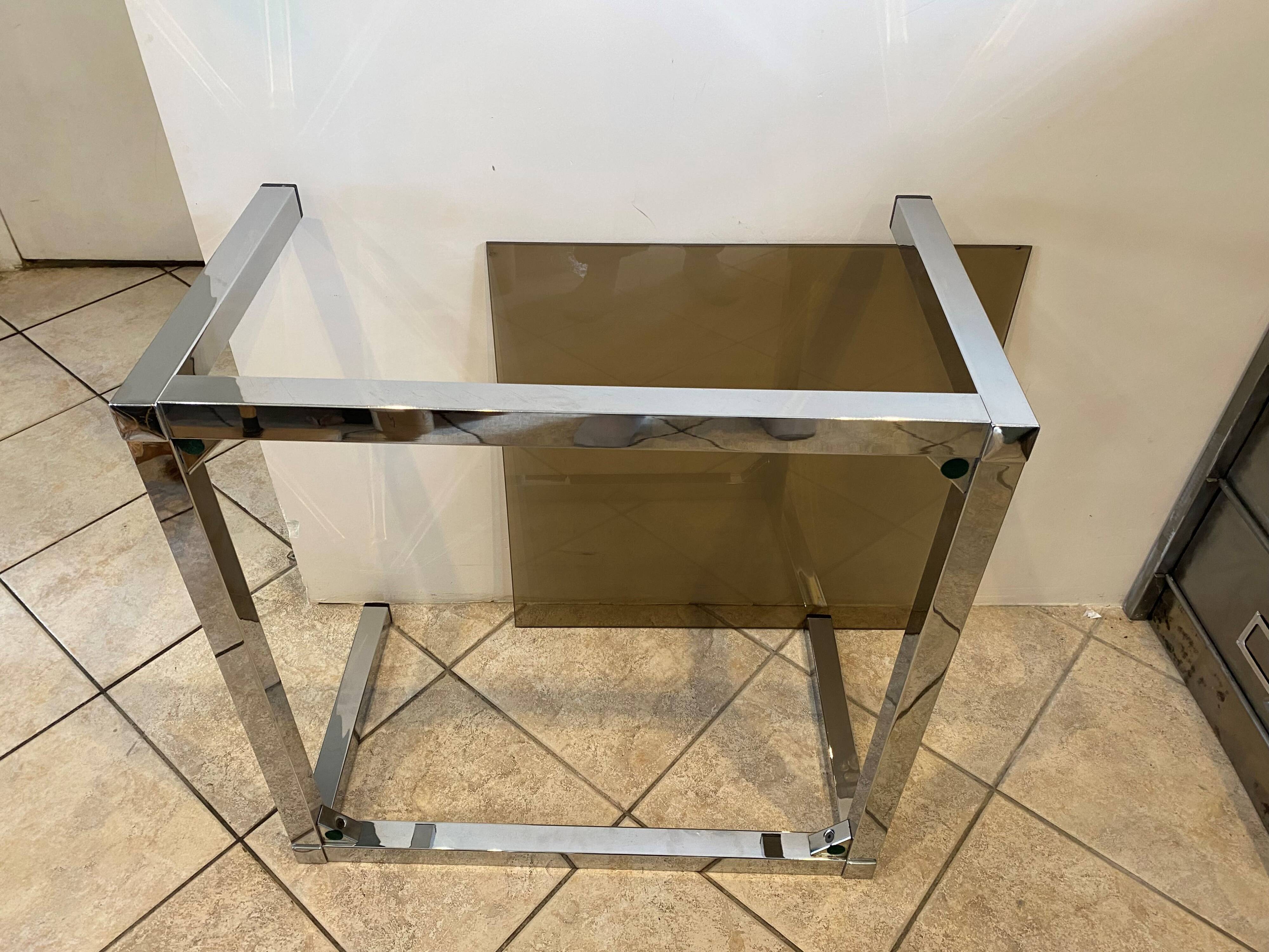 Square coffee table with smoked glass top and chrome base an70
