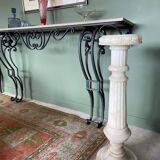 White marble column – sculpted base