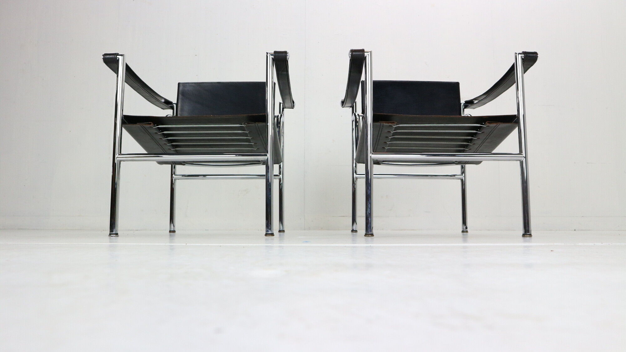 Le Corbusier Set of 2 Black Leather Armchairs Model- LC1 for Cassina, 1970s