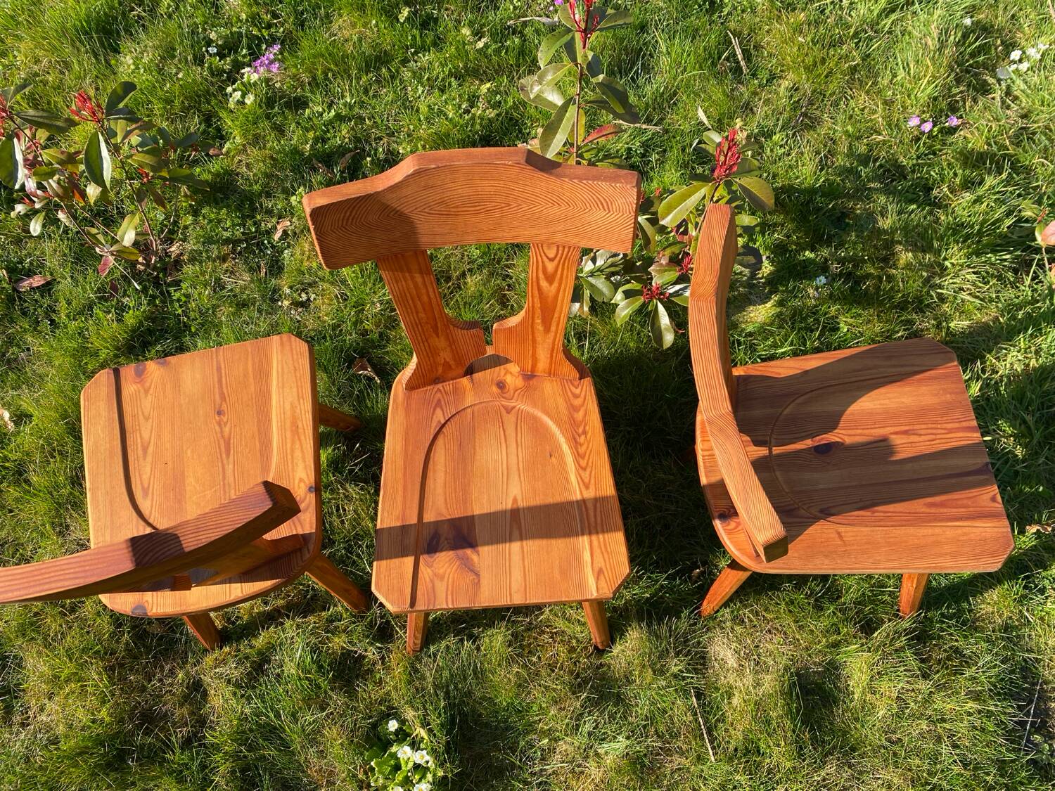 Three solid wood chairs