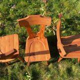 Three solid wood chairs