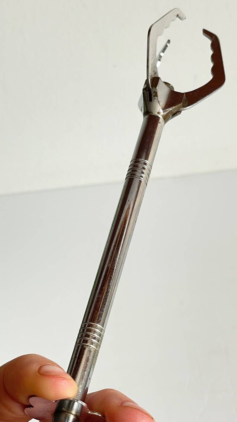 Long vintage chrome metal sugar tongs