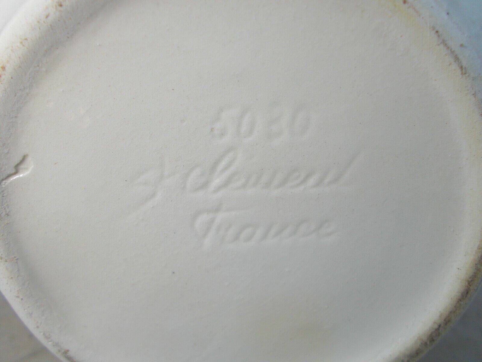 1 St Clément earthenware pouring jug decorated with characters