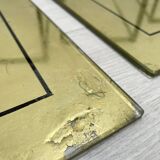Suite of metal and glass nesting tables.