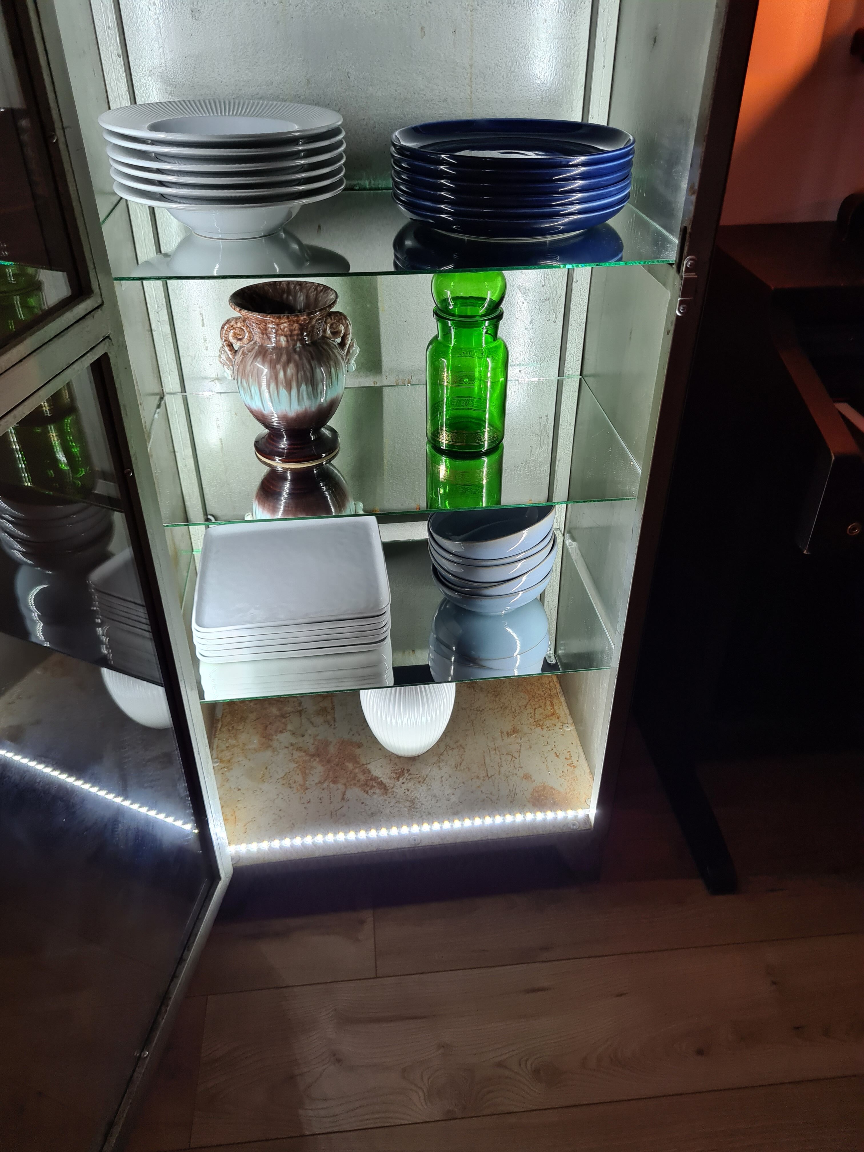 Vintage industrial showcase with LED interior lighting