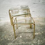 Trio of nesting tables in gold metal