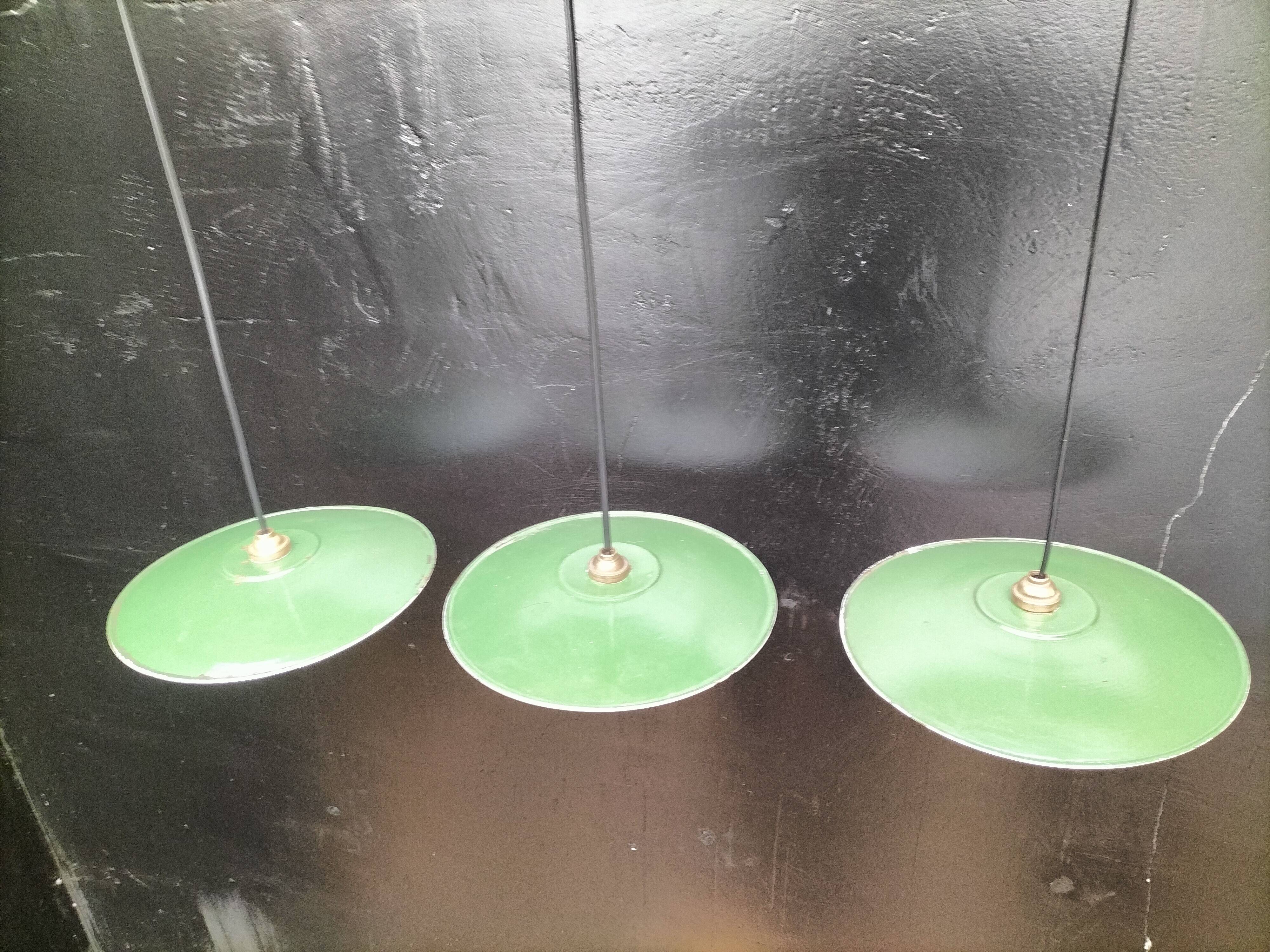 Three enamelled sheet metal suspensions