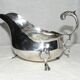 Empire style silver metal sauce boat