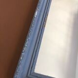 Old patinated mirror golden gray