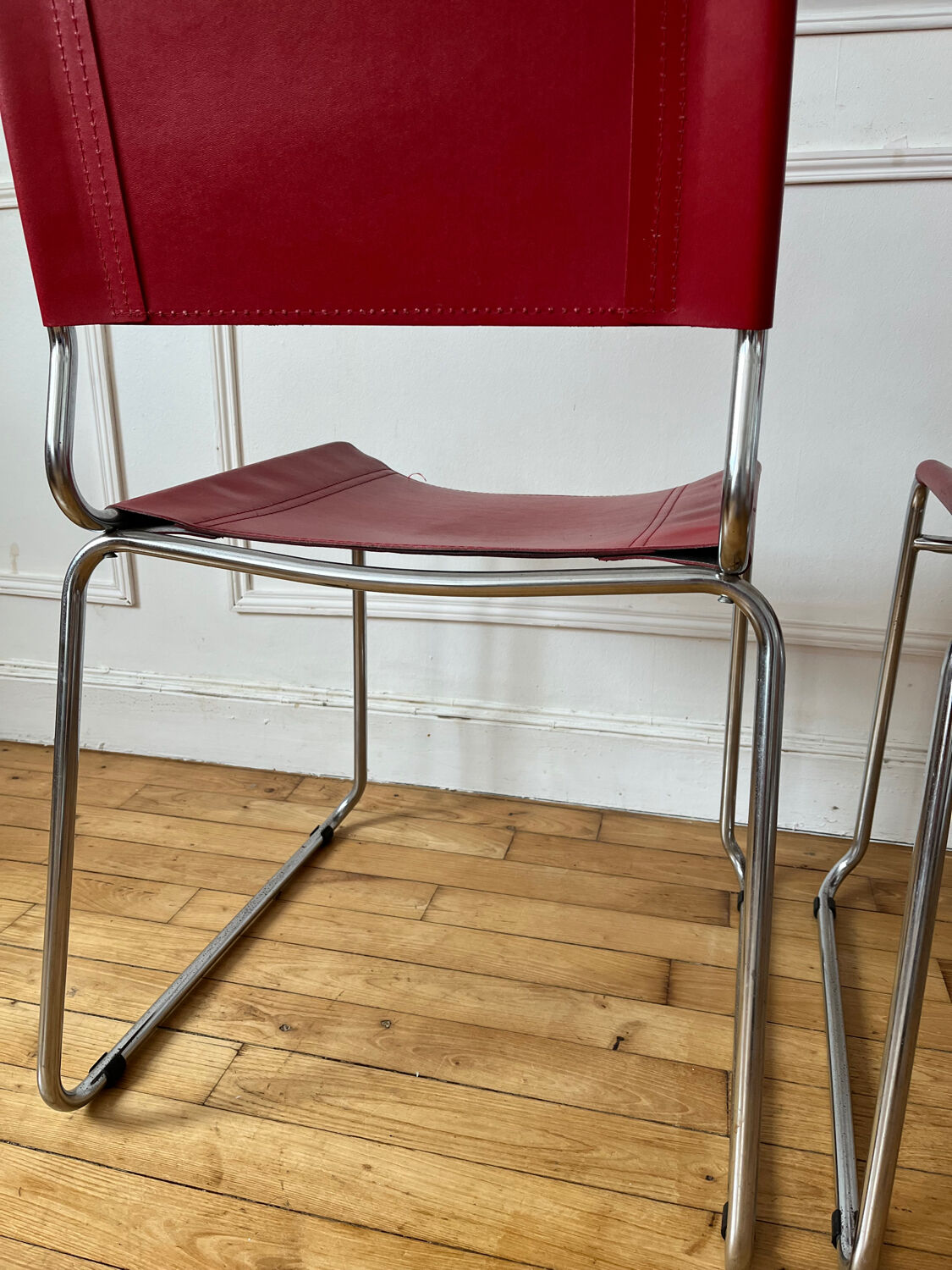 Paire de chaises vintage en métal et cuir