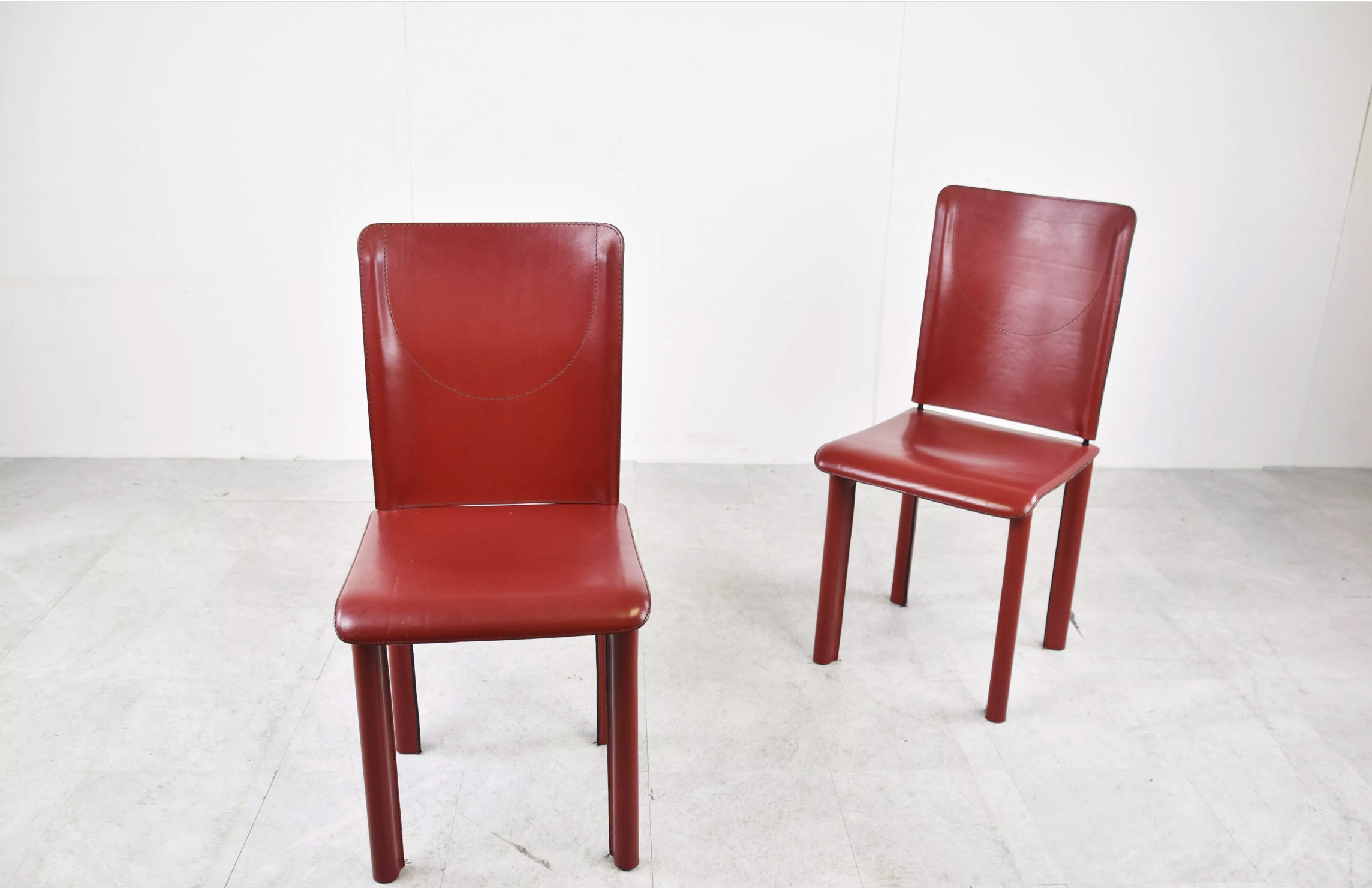 6 red leather dining chairs made in Italy, 1980s