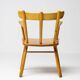 Danish organic armchair in solid birch, curved backrest, 1950s design.