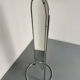 Large freestanding chrome metal full-length mirror in 1970s design.
