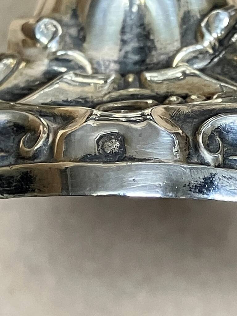 A lovely Regency-style silver mustard pot from the 19th century.